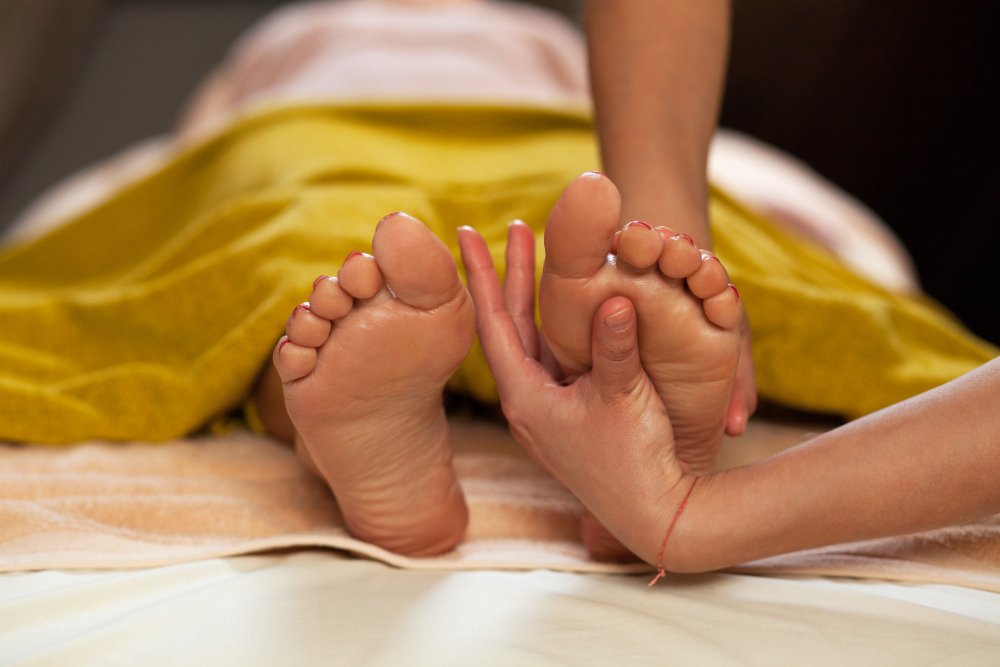 How do foot massages benefit our well-being?
